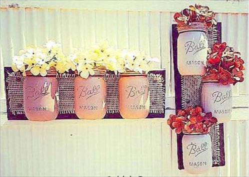 Mason jar wall vases - 50 Decorative Rustic Storage Projects For a Beautifully Organized Home